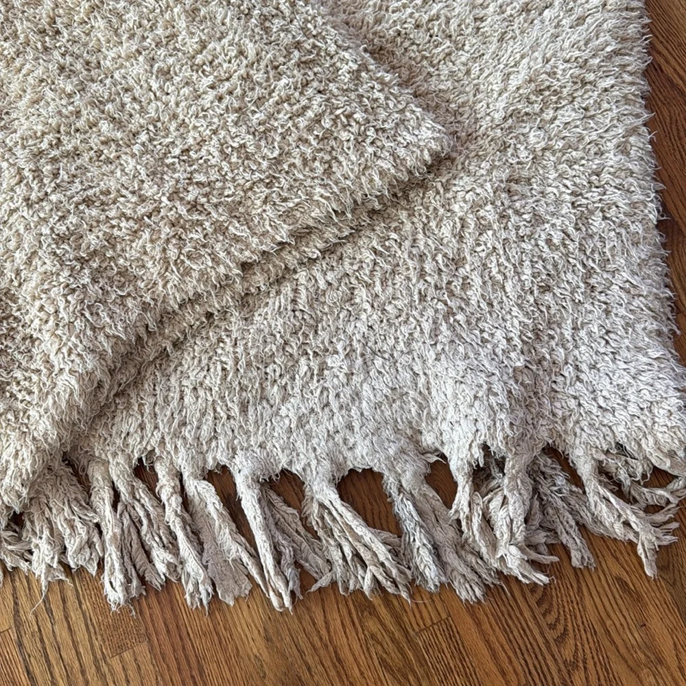 50”x 60” light loosely knit very soft light tan  afghan.